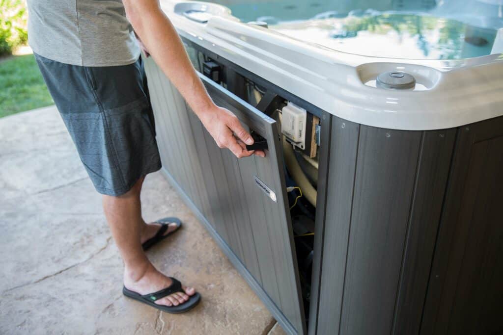 control panel being open in hot tub - hot tub leak repair